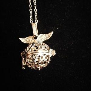 Essential oil cage necklace with colored cotton